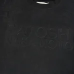 Black Satoshi Nakamoto Moto T-shirt Close-Up View
